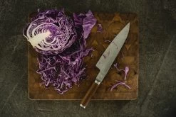 Fiskars Norden Large Cook's Knife -Kitchencia Shop Fiskars Norden Large cooks knife cabbage Hero image 1026419